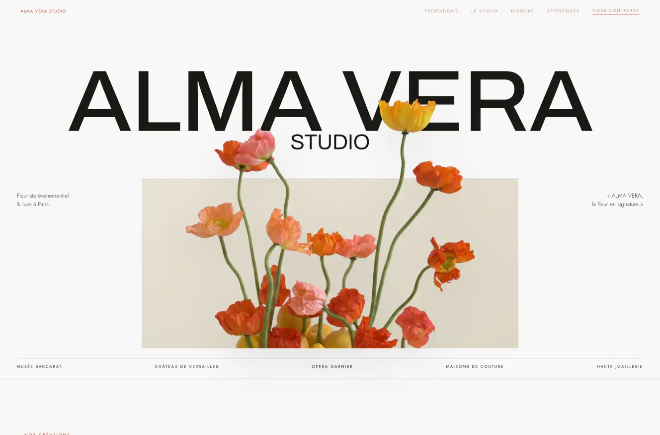 An event florist website: wide capitals crossed by a bouquet of poppies on a cream background.